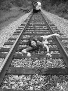 lady on train tracks